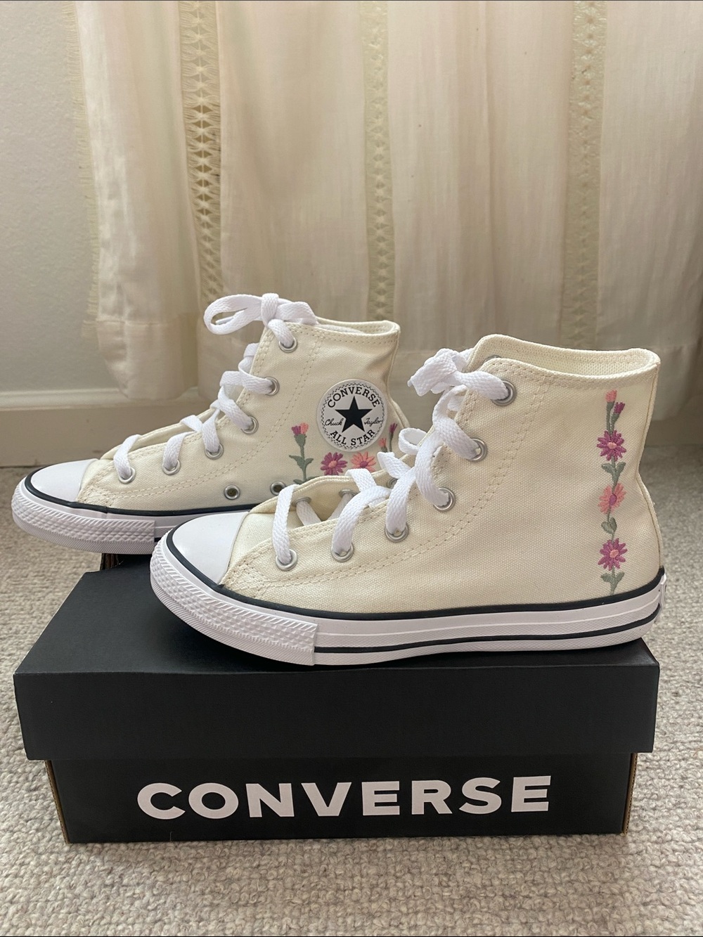 Girls converse with floral embroidery